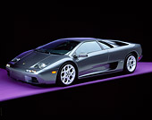 LAM 02 RK0137 04
2001 Lamborghini Diablo 6L Gray 3/4 Side View On Purple Floor Studio
