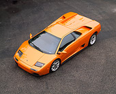 LAM 02 RK0141 01
2001 Lamborghini Diablo  Orange Overhead 3/4 Front View On Pavement
