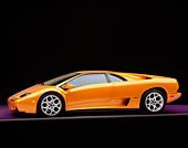 LAM 02 RK0145 02
2001 Lamborghini Diablo 6L Orange 3/4 Front View On Purple Floor Studio