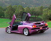 LAM 04 RK0007 01
1994 Lamborghini Diablo 30th Anniversary Edition Purple Rear 3/4 View On Pavement Doors Open