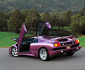 LAM 04 RK0007 02
1994 Lamborghini Diablo 30th Anniversary Edition Purple Rear 3/4 View On Pavement Doors Open