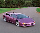 LAM 04 RK0014 05
1994 Lamborghini Diablo 30th Anniversary Edition Purple Overhead 3/4 Front View On Pavement
