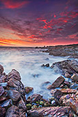 LAN 01 MH0021 01
Sun Setting Over Atlantic Ocean With Colony Of African Penguins In Background South Africa