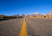 LAN 03 RK0019 03
Low Close Up Shot Of Road Mountains In Background Blue Sky