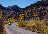 LAN 03 RK0020 09
Turning Road Shot In Valley Mountains And Trees Blue Sky