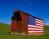 LAN 03 RK0028 08
Red Barn With American Flag On Side On Green Grass Blue Sky