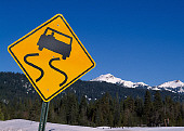LAN 07 RK0004 02
Road Sign In Snow By Trees And Mountains Blue Sky