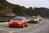 LAW 01 RK0020 01
California Highway Patrol Chasing Red Camaro On Highway