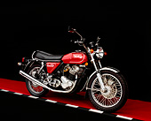 MOT 01 RK0372 04
1975 Norton MK3 850 Roadster Red 3/4 Front View On Red Floor Checkered Line Studio