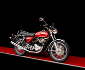 MOT 01 RK0374 03
1975 Norton MK3 850 Roadster Red 3/4 Front View On Red Floor Gray Line Studio