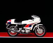 MOT 01 RK0378 05
1974 John Player Norton 850 Side View On Red Floor Gray Line Studio