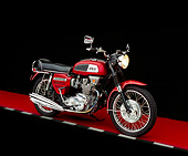 MOT 01 RK0419 03
1969 BSA 750cc Rocket 3 Red Side 3/4 View On Red Floor Checkered Line Studio