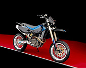 MOT 01 RK0510 09
2004 Husquvarna SMR 450 Black And Blue 3/4 Front View On Red Floor Gray Line Studio