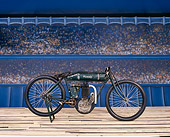 MOT 01 RK0023 06
1913 Board Track Racer Profile On Wooden Floor People In Background