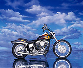 MOT 01 RK0044 05
Black Modified Shovelhead With Orange Flames Profile  On Mylar Floor Blue Clouds