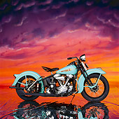 MOT 01 RK0075 01
1938 Blue Harley Davidson. profile in studio on mylar floor with sunset cloud background