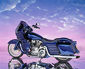 MOT 01 RK0086 06
1985 Blue FXRP Harley Davidson 1340cc Big Twin, slight 3/4 rear on mylar with purple sky background