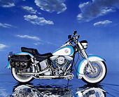MOT 01 RK0140 08
1991 Harley-Davidson Heritage Classic Light Blue And White Profile View Clouds