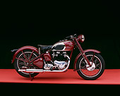 MOT 01 RK0326 09
1948 Triumph Speed Twin TR5 500cc Burgundy Profile On Red Floor Studio