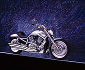 MOT 01 RK0347 05
2002 Harley Davidson V-Rod Silver 3/4 Side View On Gray Line Meteor Shower Background
