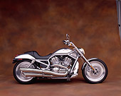 MOT 01 RK0348 02
2002 Harley Davidson V-Rod Silver Side View Brown Mottled Background