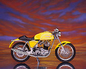 MOT 01 RK0351 06
1975 Commando Special Construction Yellow Profile View Studio