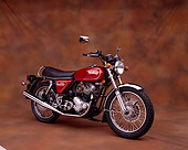 MOT 01 RK0376 03
1975 Norton MK3 850 Roadster Red 3/4 Front View On Brown Mottled Background Studio