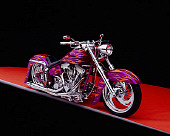 MOT 01 RK0476 05
2003 Riff Raff Custom Fuchsia Orange Flames 3/4 Front View Studio