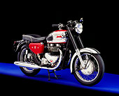 MOT 01 RK0533 02
1964 Matchless G12 CSR Red And Black 3/4 Side View On Purple Floor Studio