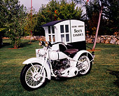 MOT 01 RK0535 02
See's Candy Motorcycle Black And White 3/4 Front View With Sidecar On Grass