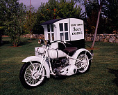 MOT 01 RK0535 03
See's Candy Motorcycle Black And White 3/4 Front View With Sidecar On Grass