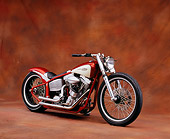 MOT 01 RK0576 07
2004 V-Twin Softail Orange And Cream 3/4 Front View On Brown Mottled Background