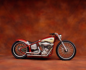 MOT 01 RK0577 07
2004 V Twin Softail Orange And Cream Side View On Brown Mottled Background