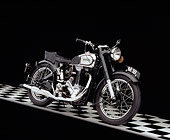MOT 01 RK0579 02
1947 Norton Model 18 Black And Chrome 3/4 Side View On Checkered Floor Studio