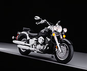 MOT 01 RK0592 02
2004 Yamaha 650 V-Star Black 3/4 Side View On Gray Line Studio
