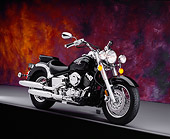 MOT 01 RK0594 07
2004 Yamaha 650 V-Star Black 3/4 Side View Orange Mottled Background Studio