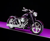 MOT 01 RK0600 06
2000 Harley Davidson, Fat Boy, Black With Flames 3/4 Side View On Purple Floor Studio