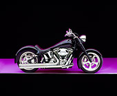 MOT 01 RK0601 09
2000 Harley Davidson, Fat Boy, Black With Flames Profile View On Purple Floor Studio