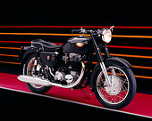 MOT 01 RK0610 03
1966 Matchless, G80, Black Motorcycle 3/4 Side View On Red Floor Colorful Lines Studio