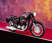 MOT 01 RK0612 01
1966 Matchless, G80, Black Motorcycle 3/4 Side View On Red Floor Mottled Background Studio