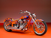 MOT 01 RK0636 01
2006 Special Construction Prostreet Orange Purple Flames 3/4 Side View On Orange Floor Studio