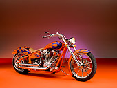 MOT 01 RK0637 01
2006 Special Construction Prostreet Orange Purple Flames 3/4 Side View On Orange Floor Studio