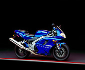 MOT 02 RK0082 09
2002 Triumph Daytona 955i Blue Side View On Gray And Red Lines Black Floor Studio