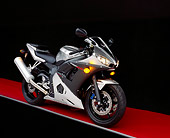 MOT 02 RK0110 02
2003 Yamaha R6 Silver 3/4 Side View On Red Floor Gray Line Studio