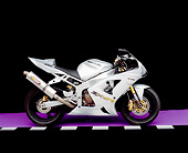 MOT 02 RK0120 05
2003 Kawasaki Ninja ZX-6R 636 Silver Side View On Purple Floor Checkered Line Studio