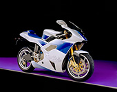 MOT 02 RK0192 05
2003 Mondial Piega Silver And Blue 3/4 Side View On Purple Floor Gray Line Studio