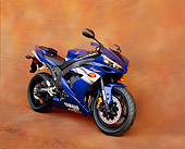 MOT 02 RK0204 01
2004 Yamaha Y2F-R1 Blue 3/4 Front View On Brown Mottled Background