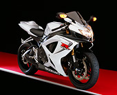 MOT 02 RK0298 05
2006 Suzuki GSXR 600 Silver And White 3/4 Front View On Red Floor Studio