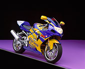 MOT 02 RK0080 02
2001 Suzuki GSXR 1000 Corona Replica 3/4 Front View On Purple Floor Studio