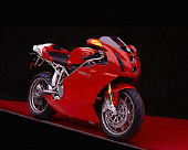 MOT 02 RK0127 05
2004 Ducati 999s Red 3/4 Front View On Red Floor Gray Line Studio